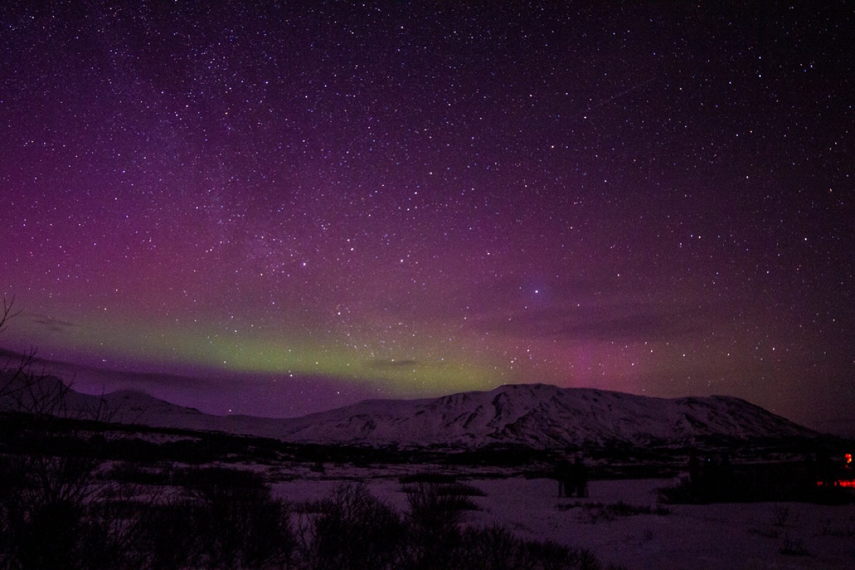 Icelandic northern lights in dark sky