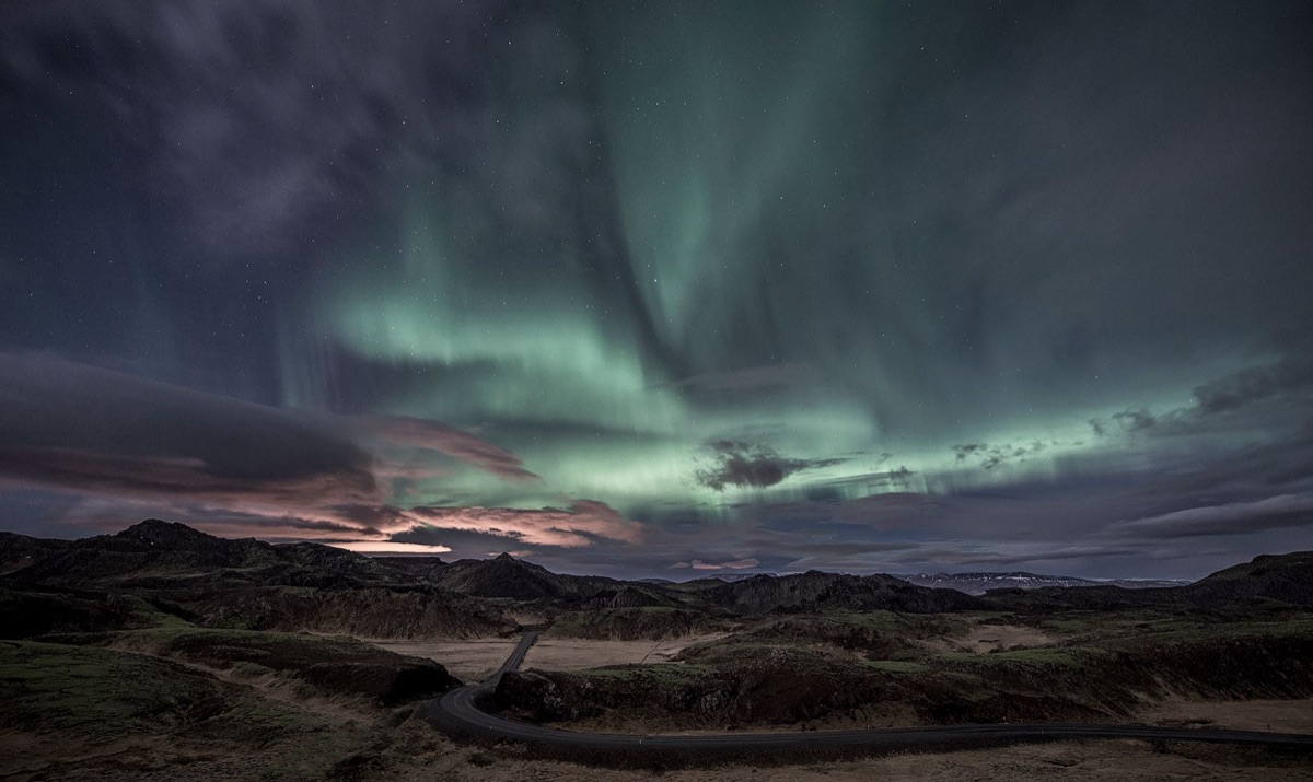 Aurora Borealis over Icelandic mountains