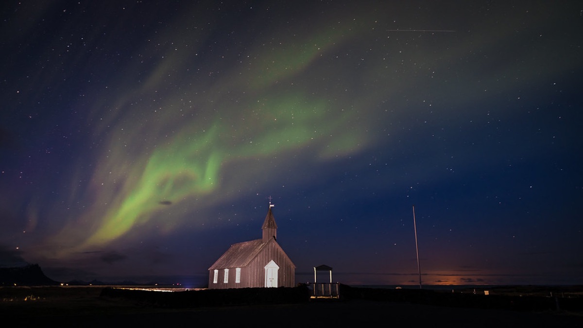 Icelandic aurora night sky with soft lighting and earthy tones