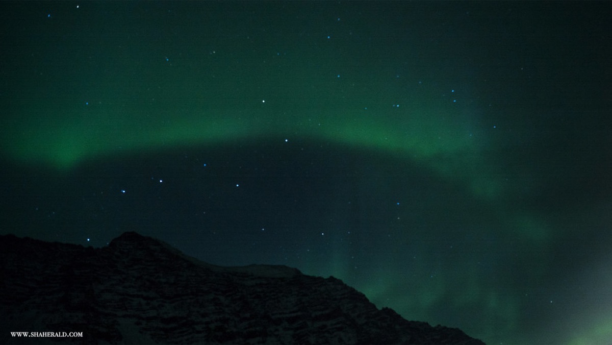Aurora Borealis in Iceland with soft lighting and earthy tones