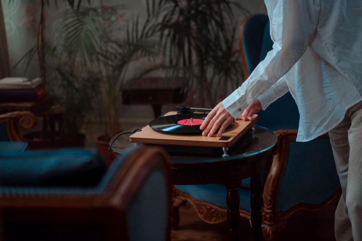 vintage record player in a dimly lit room